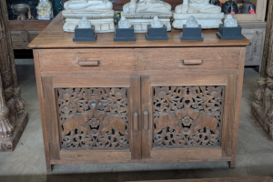 Wooden cupboard with elephants