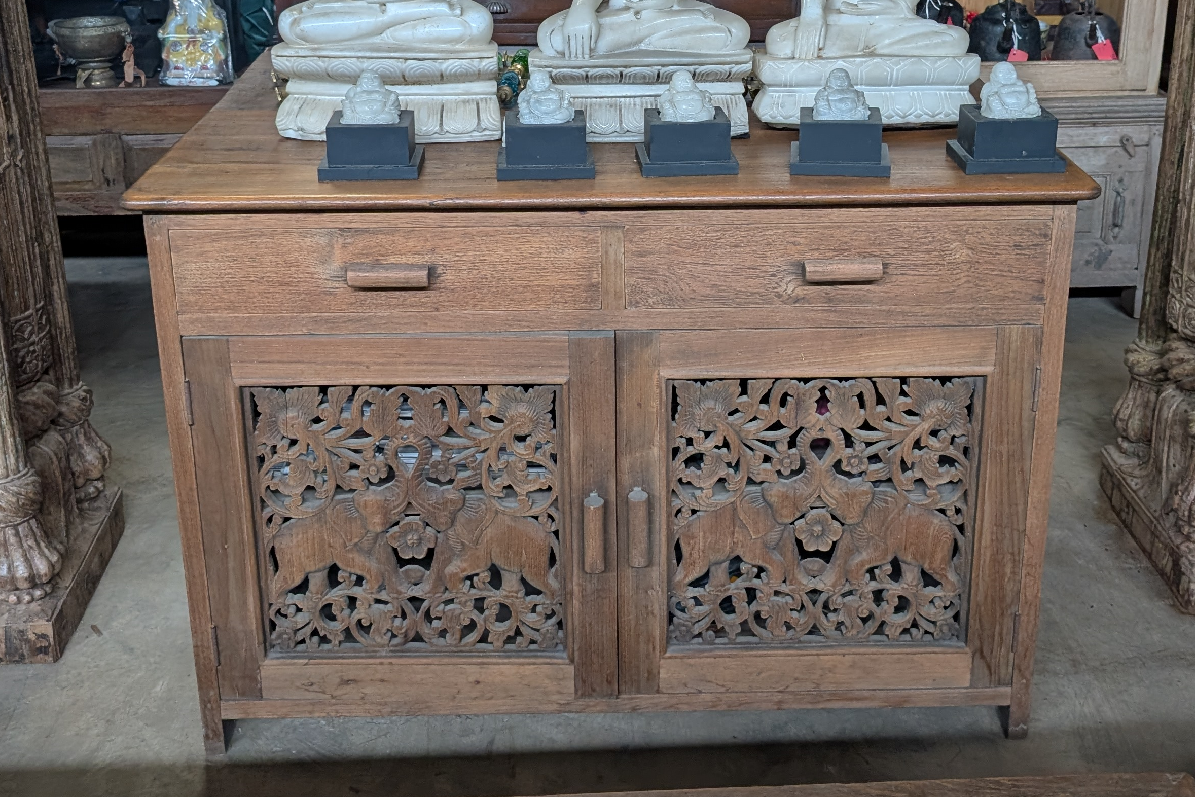 Wooden cupboard with elephants